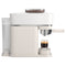 The Philips Baristina Combo Espresso Machine with Milk Frother BAR303/00 (White) is a modern espresso machine with a transparent container of freshly ground beans on top. Featuring a 16 bar pump pressure, the removable portafilter holds coffee grounds under the group head. A clear, ridged water tank is attached on the left, and a small glass of barista-quality espresso is placed on the drip tray.