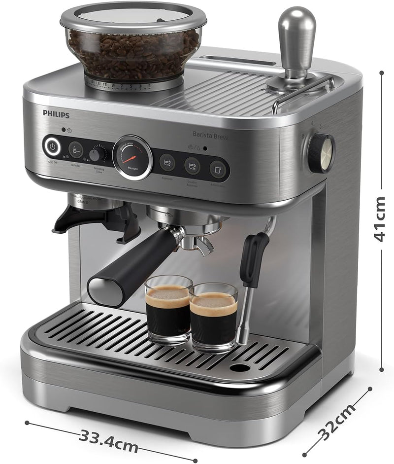 A Philips Barista Brew Semi Automatic Espresso Machine PSA3218/01 (Silver) with a built-in grinder, dual bean container, steam wand, and controls for brewing and frothing. Two small espresso cups sit on the drip tray under the stainless steel portafilter. Dimensions: 41cm high, 33.4cm wide, 32cm deep.