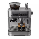 The Philips Barista Brew Semi Automatic Espresso Machine PSA3218/01 (Silver) by Philips is a sleek and elegant appliance with a built-in grinder on top, filled with coffee beans. It features several dials, buttons, and a stainless steel portafilter in the center, pouring rich espresso into two small glass cups.