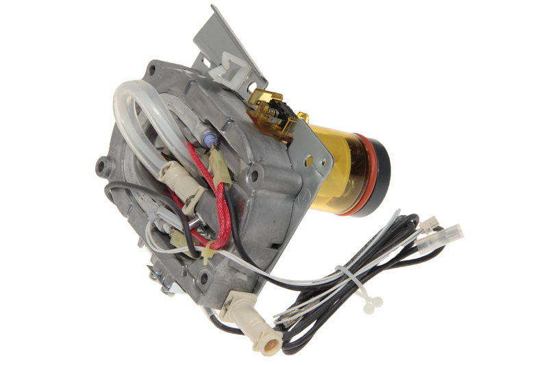 A close-up view of the DeLonghi Parts: Generator with Mechanics Valve Assembly: 7313213931 reveals various wires, connectors, and a cylindrical part covered in yellow insulating material. The intricate assembly showcases metallic, plastic, and rubber parts meticulously put together by DeLonghi.