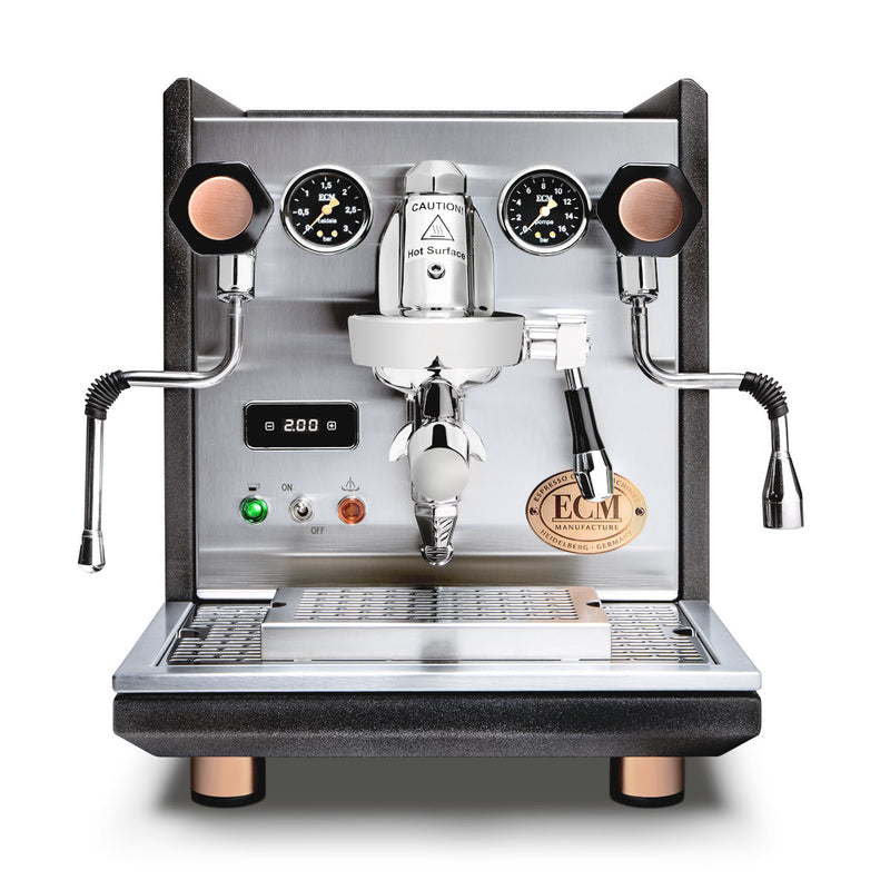 The ECM Synchronika Espresso Machine - Dual Boiler w/ PID (Heritage Edition) features a stainless steel design, dual boilers, two pressure gauges, a central brewing head, Fast Heat Up mode, black accents, dual steam wands, and a temperature display with the ECM logo on the front.