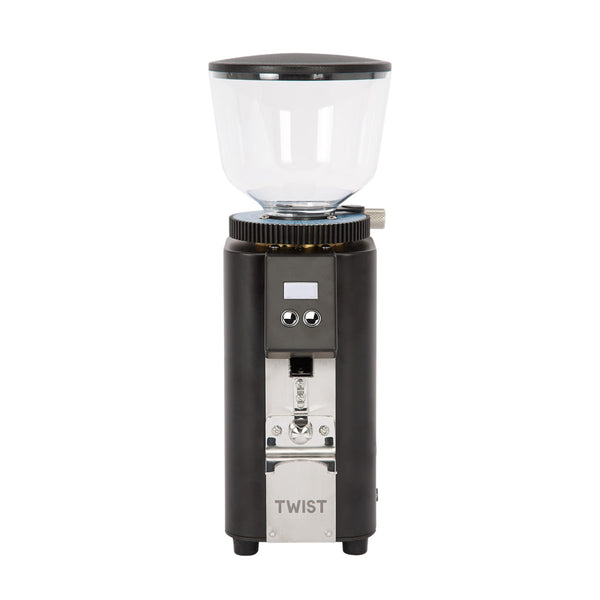 The Profitec Twist A54 Coffee Grinder, by Profitec, is a black and silver grinder with a sleek stainless steel finish. It features a transparent bean hopper, digital screen with control buttons, the "TWIST" engraving on the front lower section, and 54mm burrs for precision grinding.