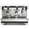 The FAEMA Prestige Compact 2 Group Head Tall Cup Autosteam 208V Espresso Machine F01-UR210Z9BFDDGA (White) is a sleek, professional-grade espresso machine with dual spouts for brewing two espressos simultaneously. Featuring a Smartboiler, digital display, pressure gauge, and Autosteam wand, it bears the "Faema PRESTIGE" label on the front and boasts a stunning stainless steel finish.