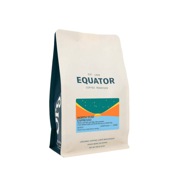 Equator Coffee Roasters North Star Coffee Bean is a 340g (12oz) whole bean medium-dark roast with chocolate, brown sugar, and almond notes. The white package has a blue label and is roasted in Brodick.