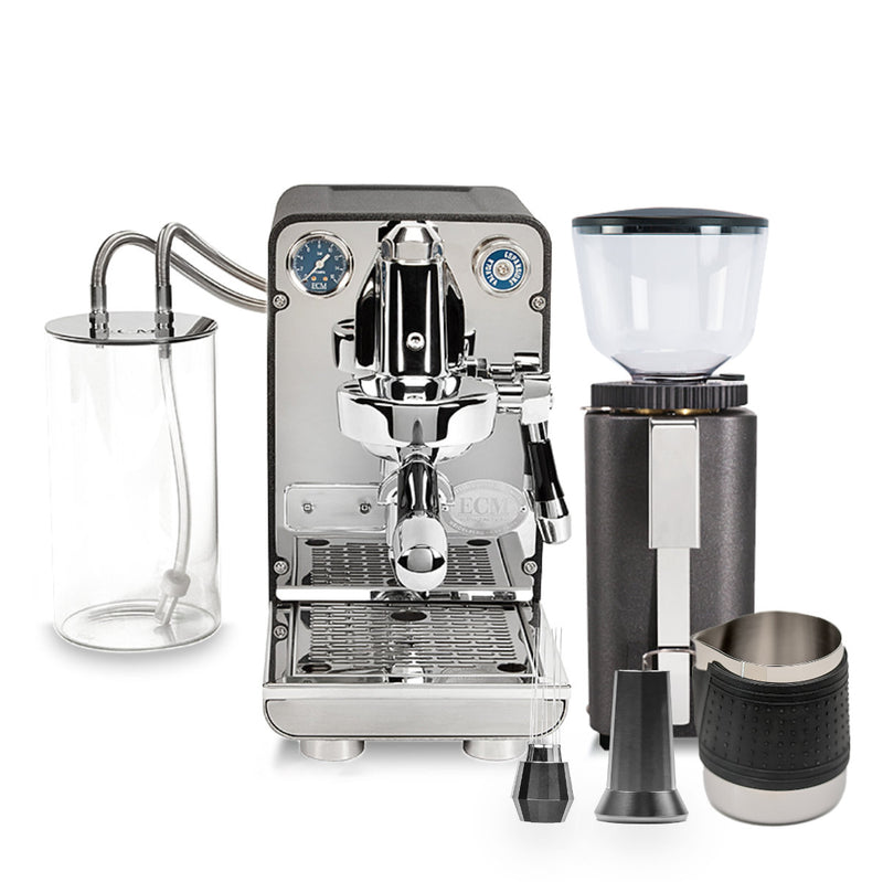 The ECM Puristika Semi Automatic Espresso Machine and C-Manuale 54 Burr Grinder (Anthracite) set includes a transparent water reservoir, E61 group head, pressure gauge, steam wand, tamper, milk frothing pitcher, and a knock box to elevate your brewing experience in the Boxing Day Promotion bundle.