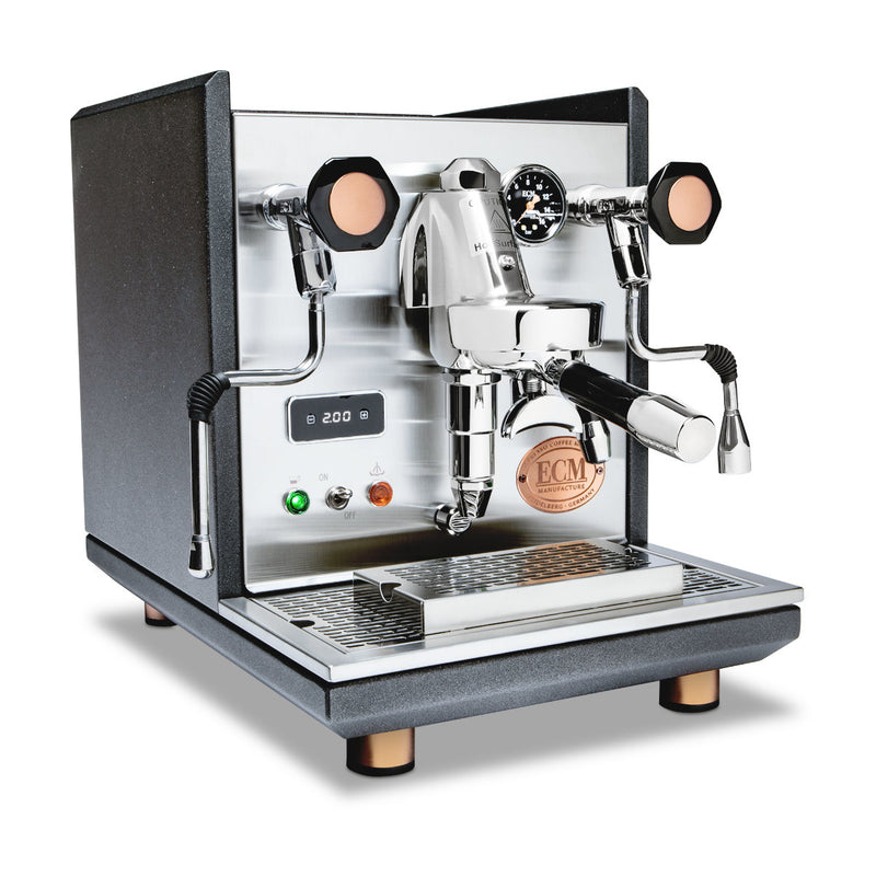 The ECM Synchronika Espresso Machine - Dual Boiler w/ PID (Heritage Edition) by ECM features a polished finish, dual steam wands, pressure gauges, black knob controls, ECM logo, and digital display on a drip tray with Fast Heat Up mode. Available for preorder now.