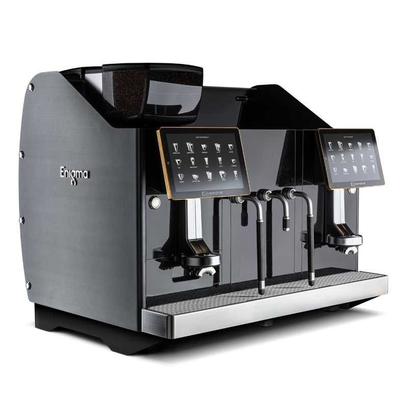 The Eversys Enigma 2 Group Head Steam Wand Wide Super Traditional Espresso Machine E'4s x-wide/ST (Charcoal) is a sleek and modern machine that enhances barista productivity with its dual screens and dual spouts. Featuring a charcoal finish with the brand name "Eversys" on the side, it combines professional elegance with functionality. The touchscreens display various beverage options to ensure precise coffee extraction.