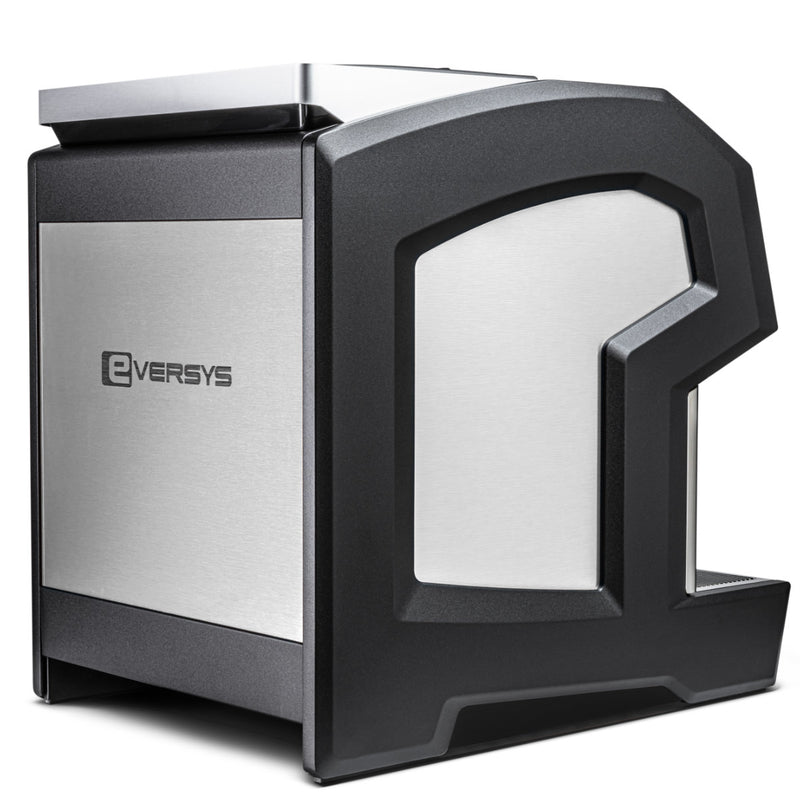 The Eversys Cameo Steam Wand Core Espresso Machine C'2s (Tempest) by Eversys is a sleek, modern coffee machine with a minimalist design. Featuring a predominantly stainless steel exterior with black accents and a steam wand, this machine provides a clean and contemporary look.