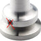 Close-up of a high-quality JoeFrex Technic Calibrated Dynamometric Adjustable Tamper Handle (Gunmetal), featuring a cylindrical shape with a groove near the base. A red "X" is marked over a small screw on the side, indicating it should not be used or adjusted. The background is plain white.