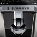 Close-up of an Eversys Cameo Steam Wand Classic Espresso Machine C'2s (Tempest) front panel with visible buttons for hot water, milk, milk foam, and steam. The screen displays 2 shots in progress and 0.0 seconds elapsed. The modern, steel design features the Eversys logo prominently at the top, perfect for crafting intricate Latte Art.