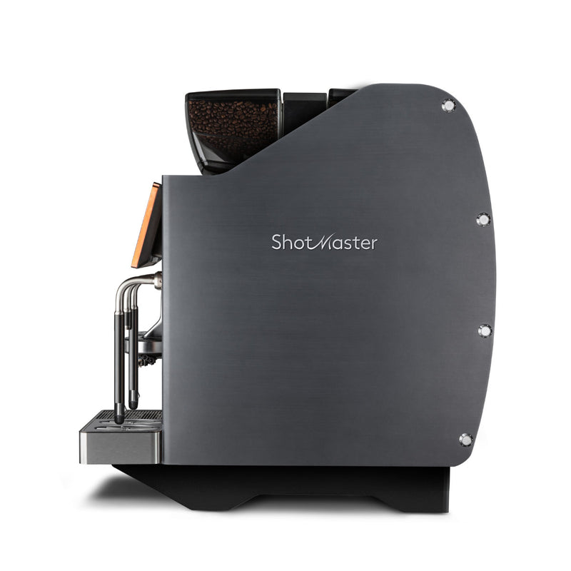 Side view of the sleek, modern Eversys Shotmaster 2 Group Head Steam Wand Super Traditional Espresso Machine s/ST (Charcoal). This fully automatic espresso machine features a visible bean hopper on top, a wooden lever, and a cup platform with a spout for consistent extraction and high volume espresso production.