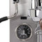 Close-up of the Profitec Jump Heat Exchanger Espresso Machine, crafted from stainless steel and equipped with an E61 group head. It features a discreet display that includes a pressure gauge labeled "Profitec," displaying numbers 0 to 12 and currently reading 1.5. This machine also comes with PID temperature control, a multifunction switch, portafilter, and steam wand for versatile brewing.