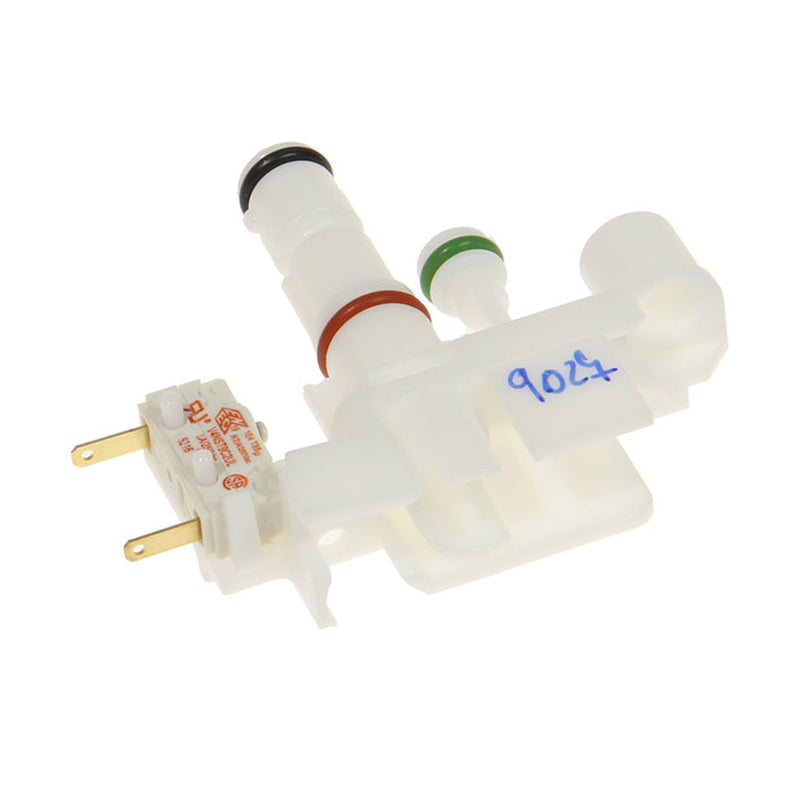 The DeLonghi Parts: Carafe Coupling: 5513227411 is a white plastic Solenoid Valve compatible with Magnifica models. It features two metal prongs on one end and multiple cylindrical connectors on the other, marked with a red and green O-ring, and has the number "9027" written in blue ink on the side.