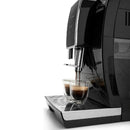 A DeLonghi Dinamica Super Automatic Espresso & Coffee Machine - ECAM35020B in black, complete with a digital display, brews two shots of espresso into small, clear glass cups. This modern machine features De'Longhi Brewing Technology, stainless steel accents, and a drip tray beneath the cups to catch any overflow. The product is an open box but unused.