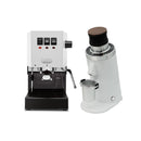 Next to a DF64 Gen 2 Grinder with DLC Burrs, which has a wooden top and metallic portafilter holder, sits the Gaggia Classic Evo Pro espresso machine in white with a black base. Both products from Gaggia showcase a modern and compact design, featuring three switches and a steam wand.