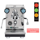 A shiny stainless steel espresso machine, the Profitec Pro 400 Espresso Machine & Eureka Mignon Specialita Grinder (Chrome) Bundle by Profitec, boasts dual pressure gauges, multiple knobs, and a steam wand. Next to it is a vertical strip displaying three colorful discs in green, yellow, and red with the text "Colourful Disclets Included!" in a pink box.