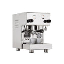 The Profitec Pro 300 Dual Boiler PID Espresso Machine (Stainless Steel) - OPEN BOX, UNUSED, from the renowned brand Profitec, is a stainless steel, semi-automatic espresso machine featuring two group heads and a steam wand. It showcases two white ceramic cups under the group heads, a pressure gauge on the front, and various knobs and switches for easy operation.