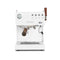 The Ascaso Steel Duo Plus 15 Amp Espresso Machine DU.303 in white boasts a sleek stainless steel body with a digital display. It features a pressure gauge, four control knobs, and a wooden handle lever. This semi-professional grade espresso machine is perfect for countertop use and includes both a milk frother and drip tray.