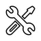 A simple, outlined design featuring a black and white icon of a wrench and a screwdriver crossed diagonally. The wrench is horizontally positioned with the screwdriver angled upwards behind it, symbolizing tools or repair typically associated with the Service Centre: 1 Hour of Labor Cost by HCS, often seen in service centers for Home Coffee Solutions.