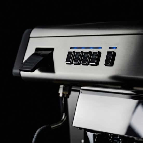 Close-up of the Conti X-One Espresso Machine in black, showcasing its sleek stainless steel design with five black buttons. It features advanced electronic temperature adjustment and is accented by blue indicator lights on a dark background, embodying a modern and minimalist aesthetic.