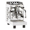 The Bezzera Aria TOP Heat Exchange Espresso Machine w/ PID, Flow Control (White) combines sleek aesthetics with a stainless steel build and a white square-patterned casing. It features two portafilters, a pressure gauge, and steam wands. The top is black with square cutouts, prominently displaying the brand name "Bezzera" on the front.