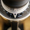 Close-up of a DF64 Gen 2 Single Dose Coffee Grinder With DLC Burrs (Black) - Open Box, Unused by DF Grinders. The dial is set at the 45 mark for fineness, featuring clear numerical indicators and a stylish, modern design with the word "moka" prominently displayed. Equipped with 64mm DLC burrs for zero retention grinding, the numbers on the dial range from 30 to 65.