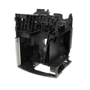 The DeLonghi Parts Body Frame, model 5513216731, is a black plastic coffee machine brew group from DeLonghi's Magnifica series. It boasts a rectangular and complex structure with various slots, compartments, and mechanical components designed for housing brewing mechanisms. The unit exhibits a combination of solid and open framework sections.