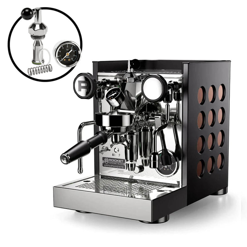 The Rocket Appartamento TCA Espresso Machine (RE502B3C12) features metallic accents, a side handle, and pressure gauge. Its design reveals inner components like a spring, small gauge, and temperature control adjustment. The black and copper machine is adorned with circular wood details on the sides.