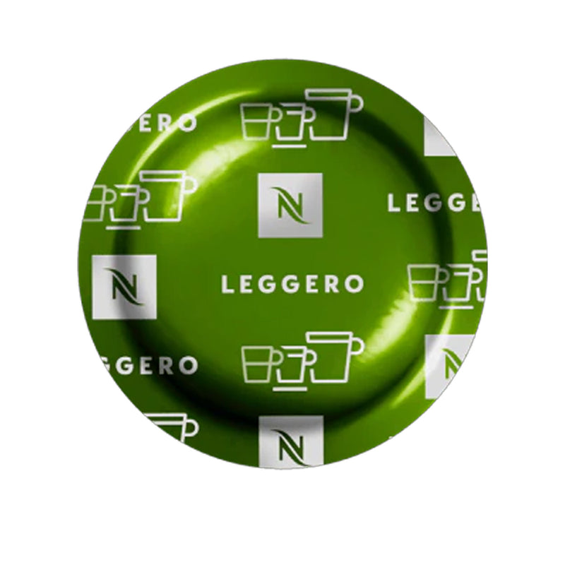 A close-up image of a Nespresso Espresso Leggero Professional capsule from a box of 50, showcasing its vibrant green lid adorned with white coffee cup icons, the Nespresso logo, and the word "LEGGERO" repeated in white text, indicating a mild blend coffee with subtle cocoa notes.