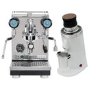 Beside the sleek white DF64 Gen 2 Grinder with DLC Burrs, the Profitec Pro 400 Espresso Machine showcases its stainless steel design, dual pressure gauges, and E61 group head. The machine is equipped with PID temperature control, a central portafilter, and a drip tray. The grinder is distinguished by its wooden top and a small metallic cup.