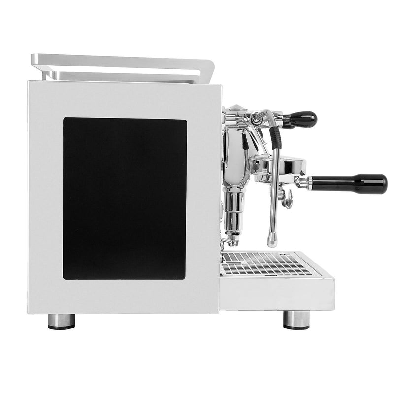 Side view of the Profitec Pro 600 Dual Boiler & Quick Steam Espresso Machine with E61 Group Head and sleek silver finish complemented by black accents. This modern industrial machine, brought to you by Profitec, features a steam wand, portafilter handle, bottom drip tray, and dual boiler technology. The minimalist design is enhanced by its clean, angular lines and PID temperature controller.