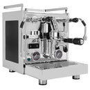 The Profitec Pro 600 Dual Boiler & Quick Steam Espresso Machine with E61 Group Head and PID Temperature Control is a stainless steel espresso machine that boasts a polished finish. It features dual pressure gauges, a steam wand, a hot water spout, and a portafilter. Equipped with knobs and handles for controlling its functions and a drip tray underneath, this Profitec espresso machine incorporates Dual Boiler technology for precise brewing.