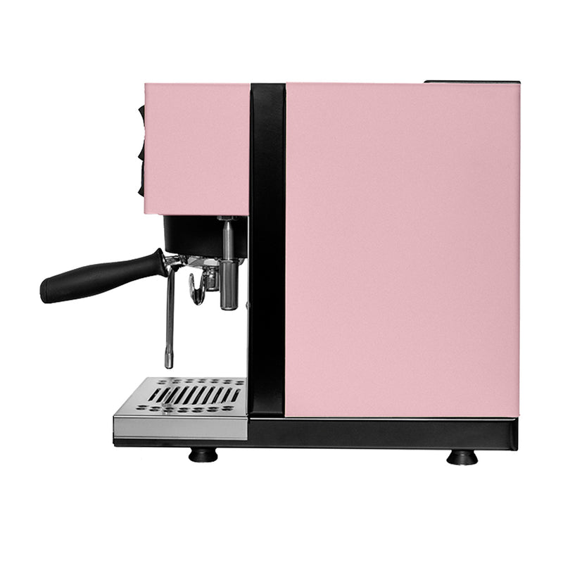 The Rancilio Silvia Pro X Dual Boiler Espresso Machine with PID (Pink) combines professional performance with sleek, modern design. It features a portafilter handle, steam wand, and bottom drip tray in a compact and stylish form. The pink exterior with black accents makes it perfect for both home use and small cafes.