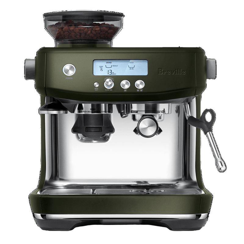 A Breville The Barista Pro Espresso Machine BES878OLT in Olive Tapenade, featuring a digital display with icons and numbers, two espresso spouts, a built-in grinder on top filled with coffee beans, and a steam wand on the right side. This machine includes the ThermoJet heating system and various buttons for settings.