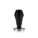 The Normcore Spring Loaded Tamper V4 (58mm) by Normcore is a black espresso tamper featuring a stainless steel base. Its ergonomic handle boasts a smooth matte finish, and the spring-loaded tamper mechanism allows it to stand upright. The clean design highlights its functionality and simplicity.