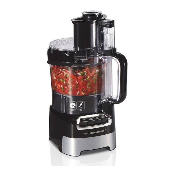 Image of a Hamilton Beach Stack and Snap Food Processor (10-Cup) filled with chopped tomatoes, onions, and green peppers. The Hamilton Beach appliance has a black base with control buttons and a transparent container showing its 10-cup capacity contents inside.