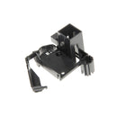 A black, plastic electrical component with various shaped sections, including a rectangular housing and protruding connectors. The component appears to be designed for use in an electronic or mechanical assembly, such as the DeLonghi Switch Bracket (part number 5313213441) found in a Magnifica S espresso machine.