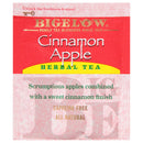 A packet of Bigelow Cinnamon Apple Tea Bags is shown, highlighting its caffeine-free and all-natural ingredients. The label describes the tea as "scrumptious apples combined with a sweet cinnamon finish." The background is red with brand details in gold. Perfect for those who enjoy natural fruit flavors.