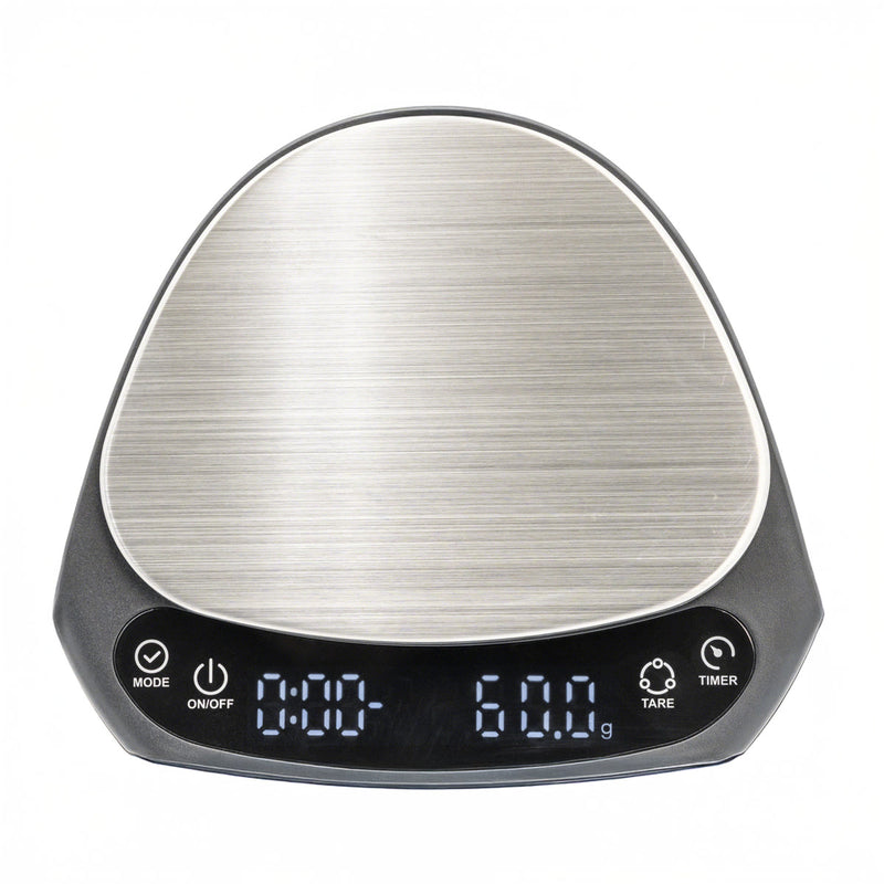 The Whitebird Ultrathin Scale KC203, with a sleek metallic surface and LED display, is ideal for professional baristas. It features a high-precision sensor and displays "60.0 g" on the right and "0:00" on the left, with mode, on/off, tare, and timer buttons neatly below.