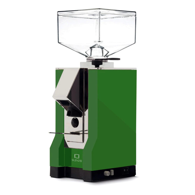 The lime Eureka Mignon Silenzio Grinder boasts a transparent bean hopper on top and a sleek stainless-steel front. This rectangular device includes a small portafilter holder below the grinder chute, with the brand name "Silenzio" printed near the bottom.