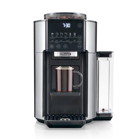 The DeLonghi TrueBrew Fully Automatic Drip Coffee Machine CAM51025MB (Stainless Steel) is a sleek device featuring a digital display showing "7:30," multiple buttons for various brewing options, and a dispenser filling a mug with coffee. This waste-free machine from DeLonghi has an attached transparent water reservoir, making it easy to brew the perfect single-serve drip coffee effortlessly.